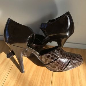 Never worn Leather Heeled Dress Shoes. DSW